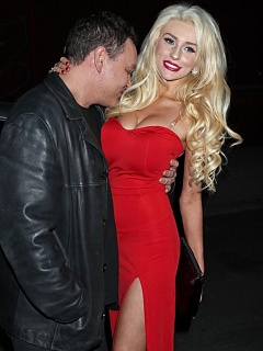 Pictures of bombshell Courtney Stodden filling a sexy red dress perfectly